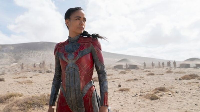 "Eternals" movie picture of first deaf superhero, Makkari, in a red and silver costume.