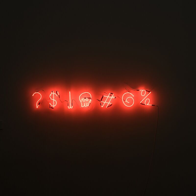 Neon sign with special characters.
