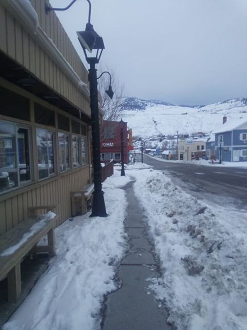 Snow inadequately shoveled from pedestrian sidewalk