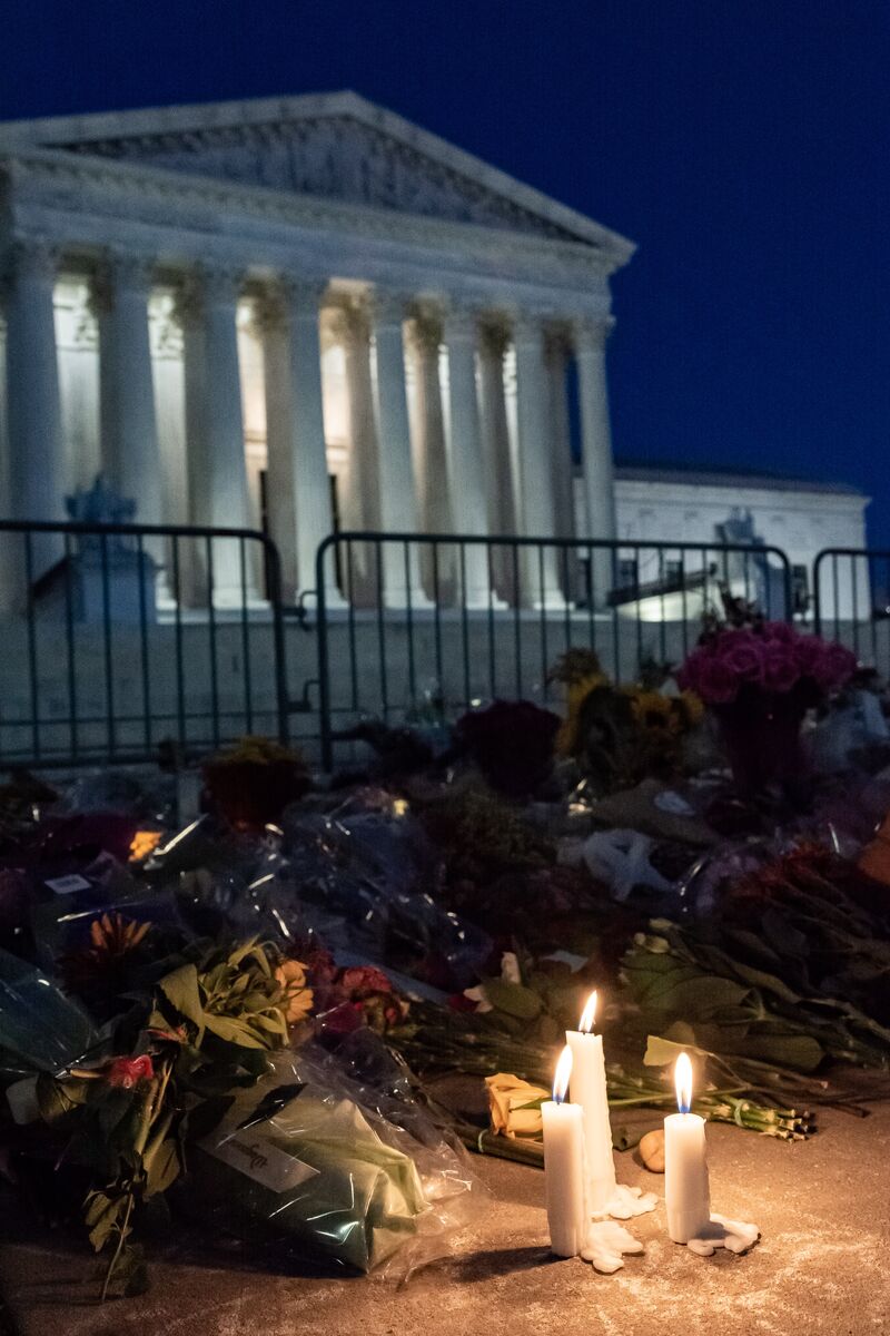 A candle lit before the White House in honor of the late Supreme Court Justice, Ruth Bader Ginsburg.