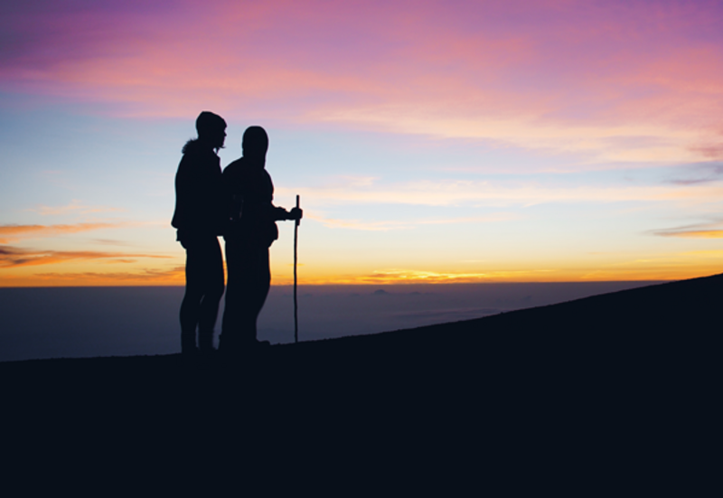 Two individuals about to embark on a long journey.