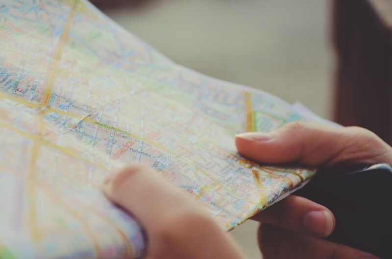 a person holding a map