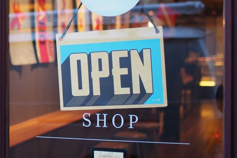 open sign on the door of a shop