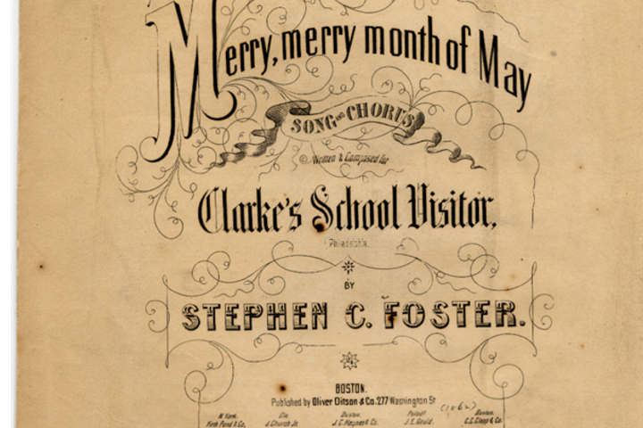 Sepia photo of a song book with the title "Merry, merry month of May."