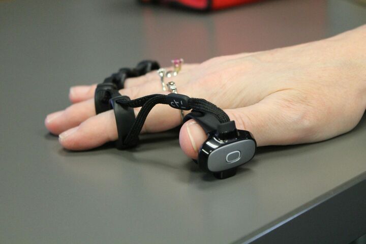 Hand with Tap Strap wearable keyboard