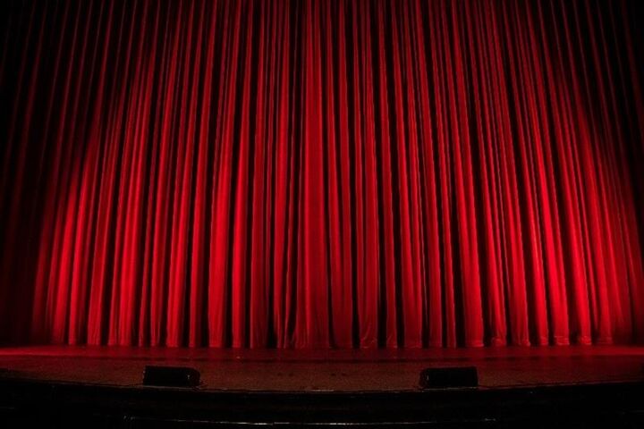 a red curtain on a stage