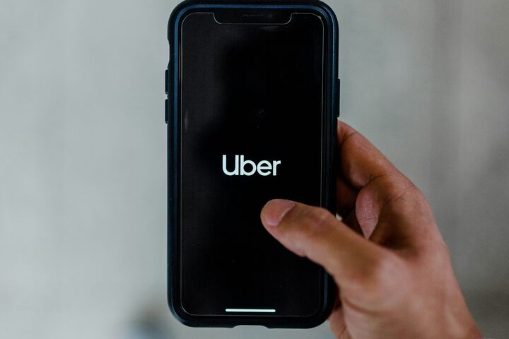 Phone showing Uber app