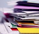 stack of papers and filers