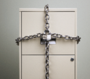 filing cabinet with drawers locked with chains
