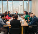 a group of diverse colleagues working together in an office