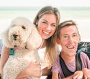 Shane and Hannah Burcaw with their Labradoodle, Chloe.