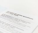 a close up of a paper titled Answers to some Questions You May Have with some text below 
